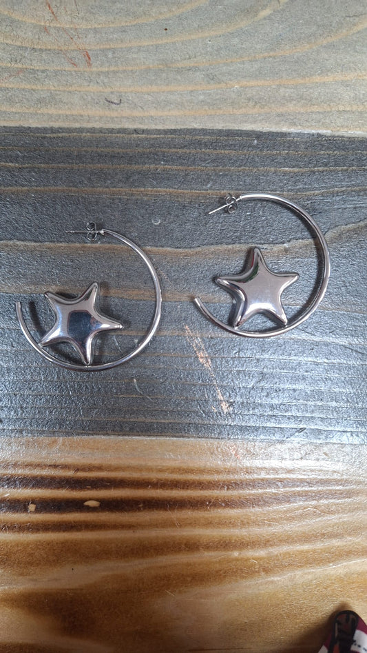 Orecchini a cerchio con stella