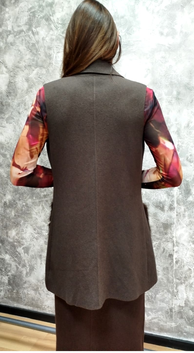 Spolverino con tasche in pelliccia