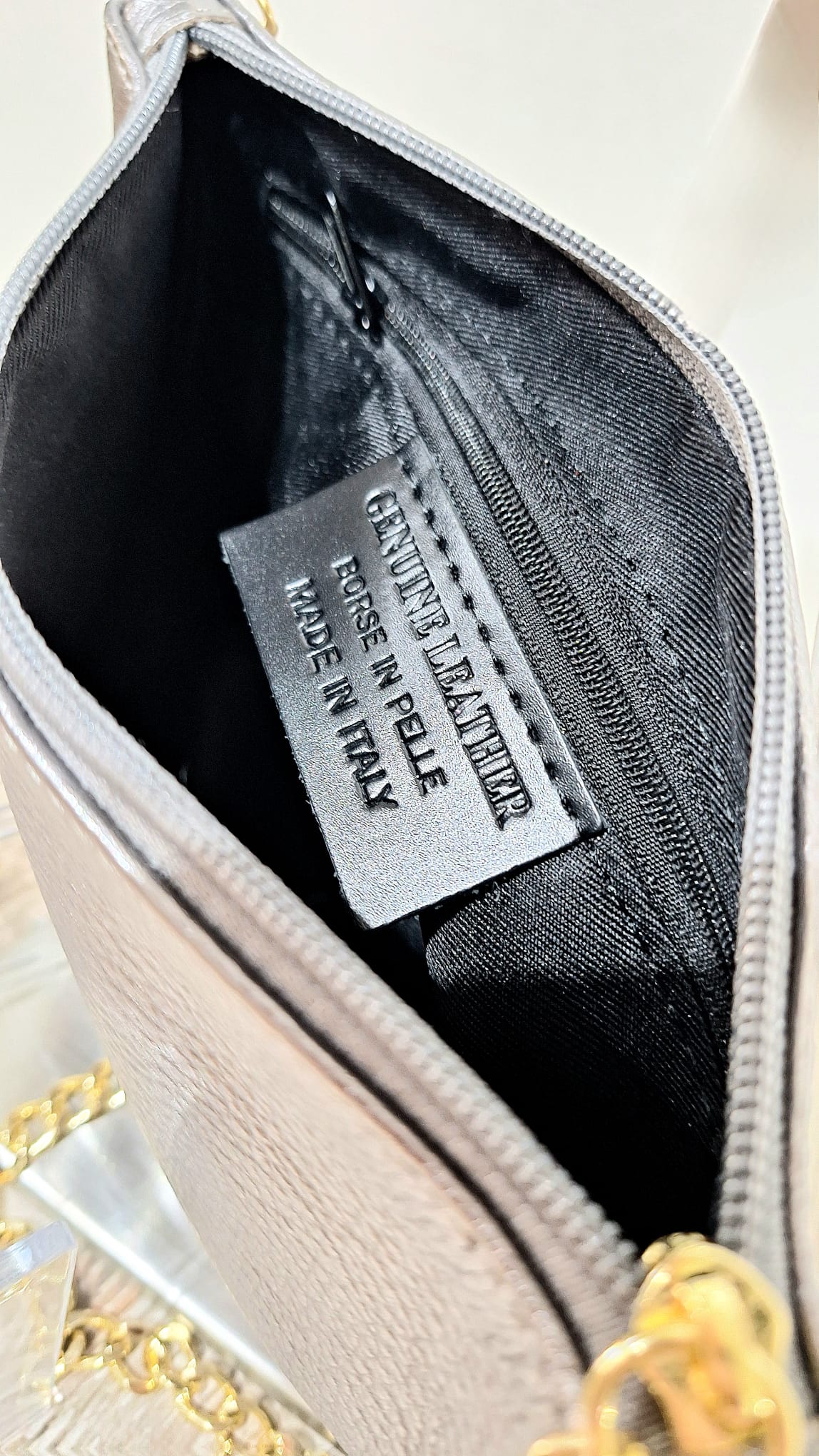 Pochette in pelle lurex