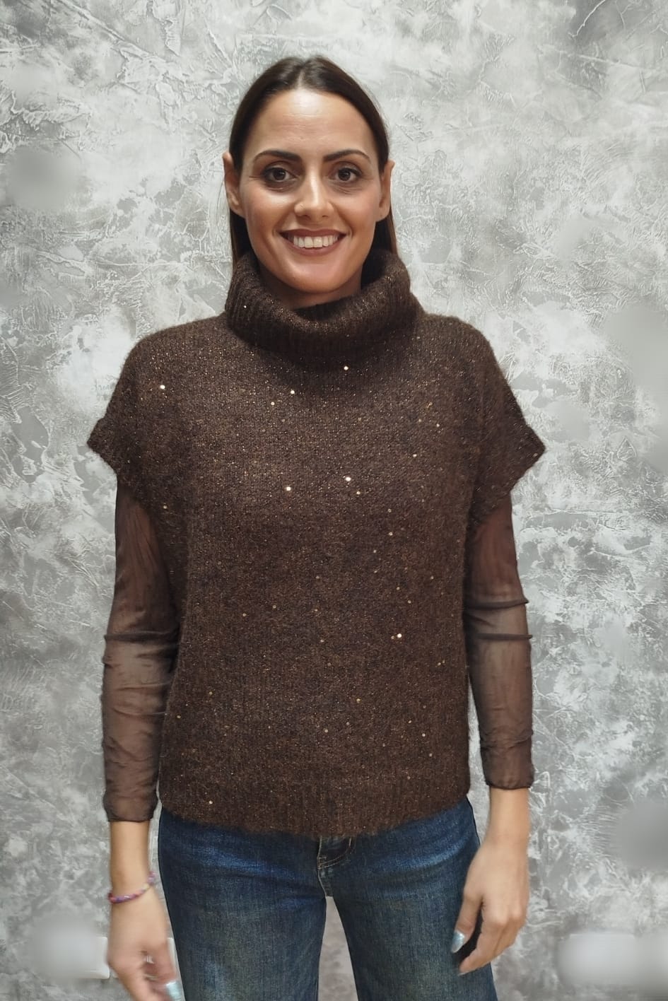 Pullover collo alto senza maniche