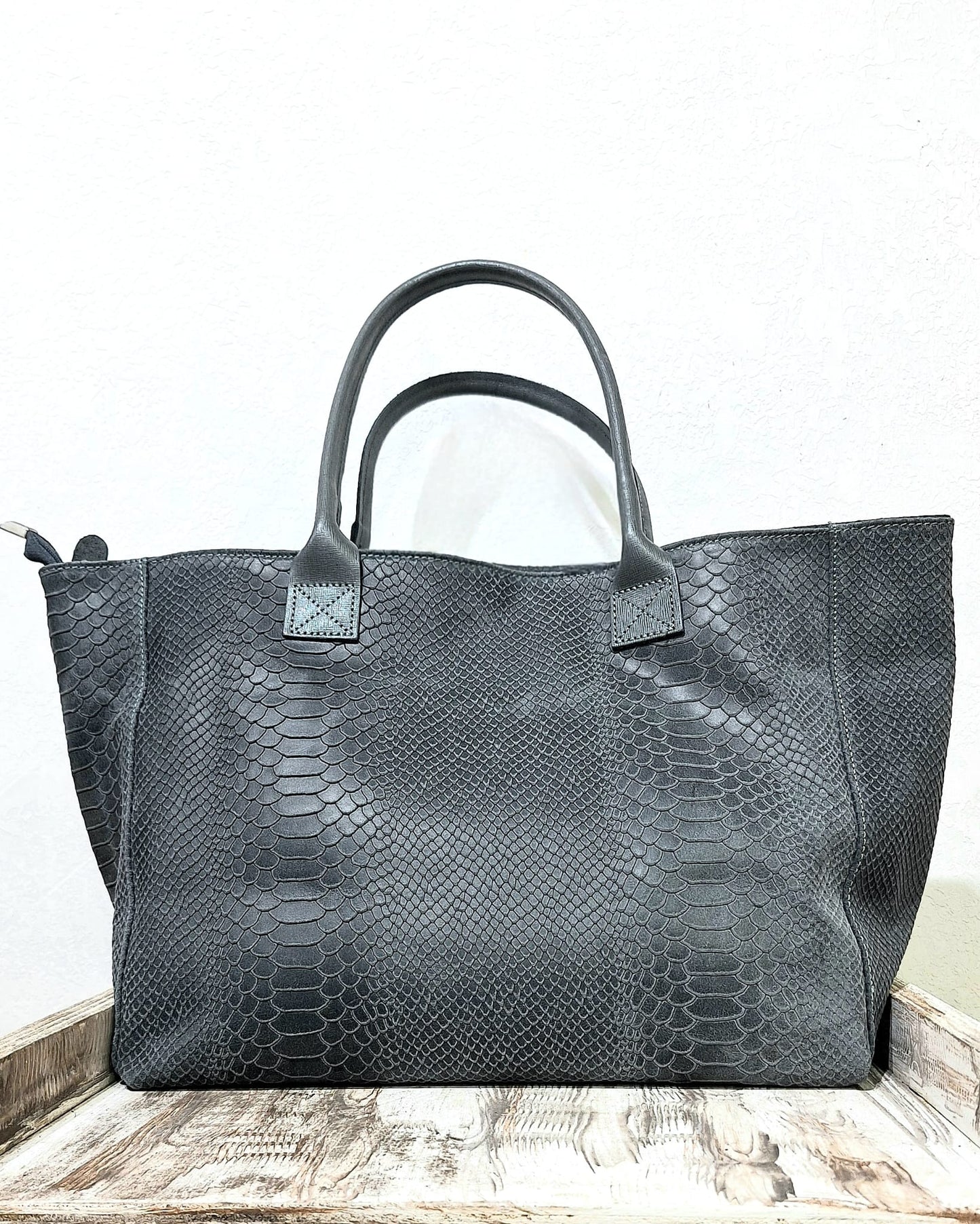 Borsa in pelle pitonata