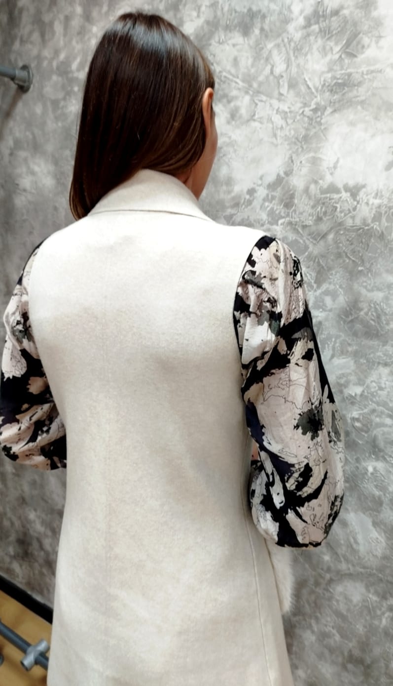 Spolverino con tasche in pelliccia