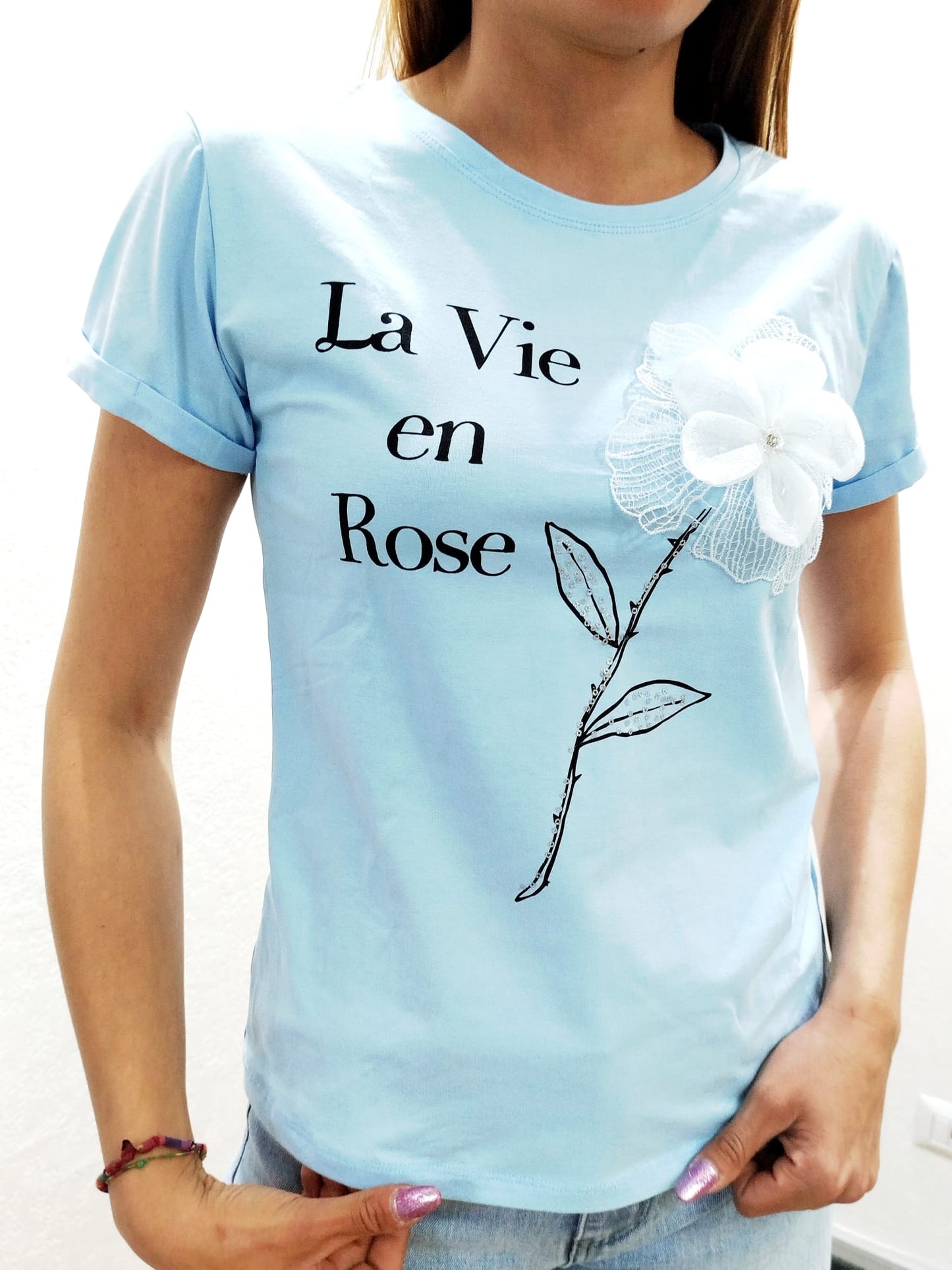 T-shirt con fiore