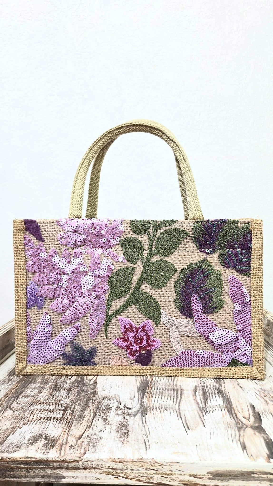 Borsa in juta con applicazioni in paillettes