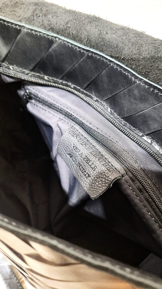 Borsa in pelle intagliata