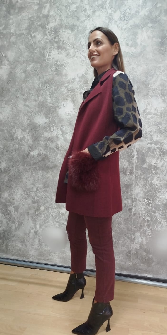 Spolverino con tasche in pelliccia