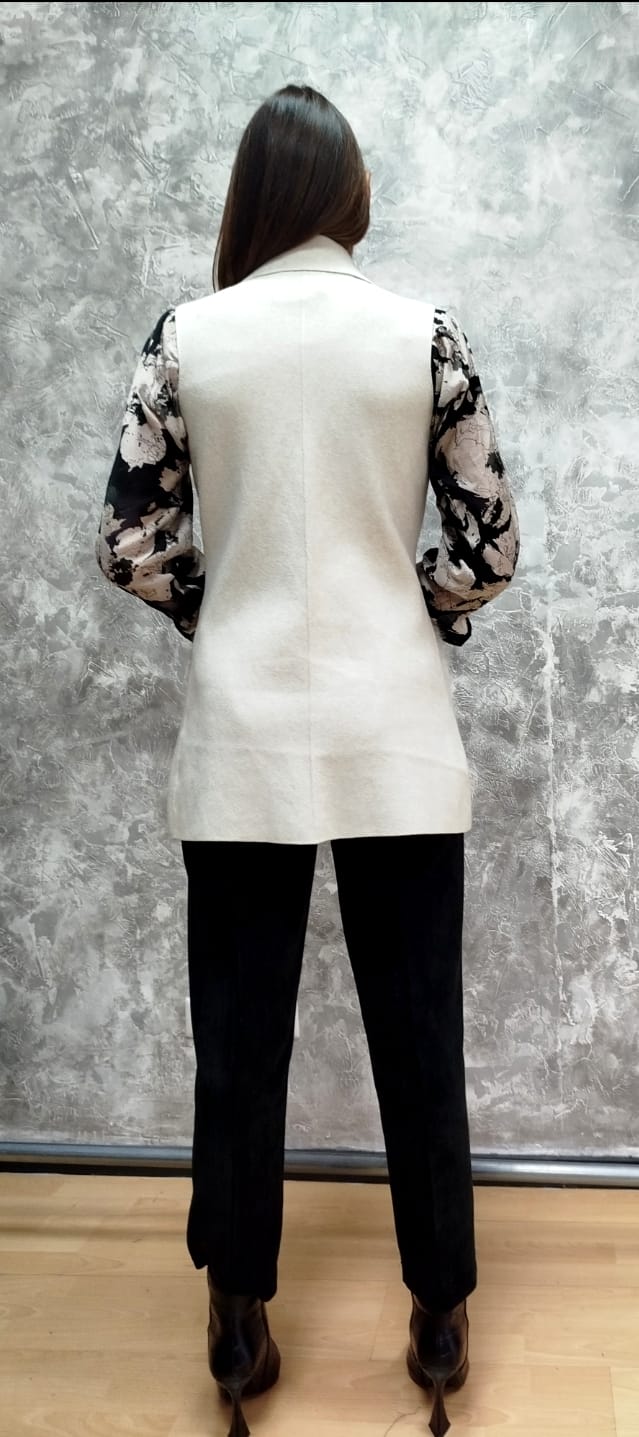 Spolverino con tasche in pelliccia